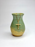 The Twist Cross Necklace