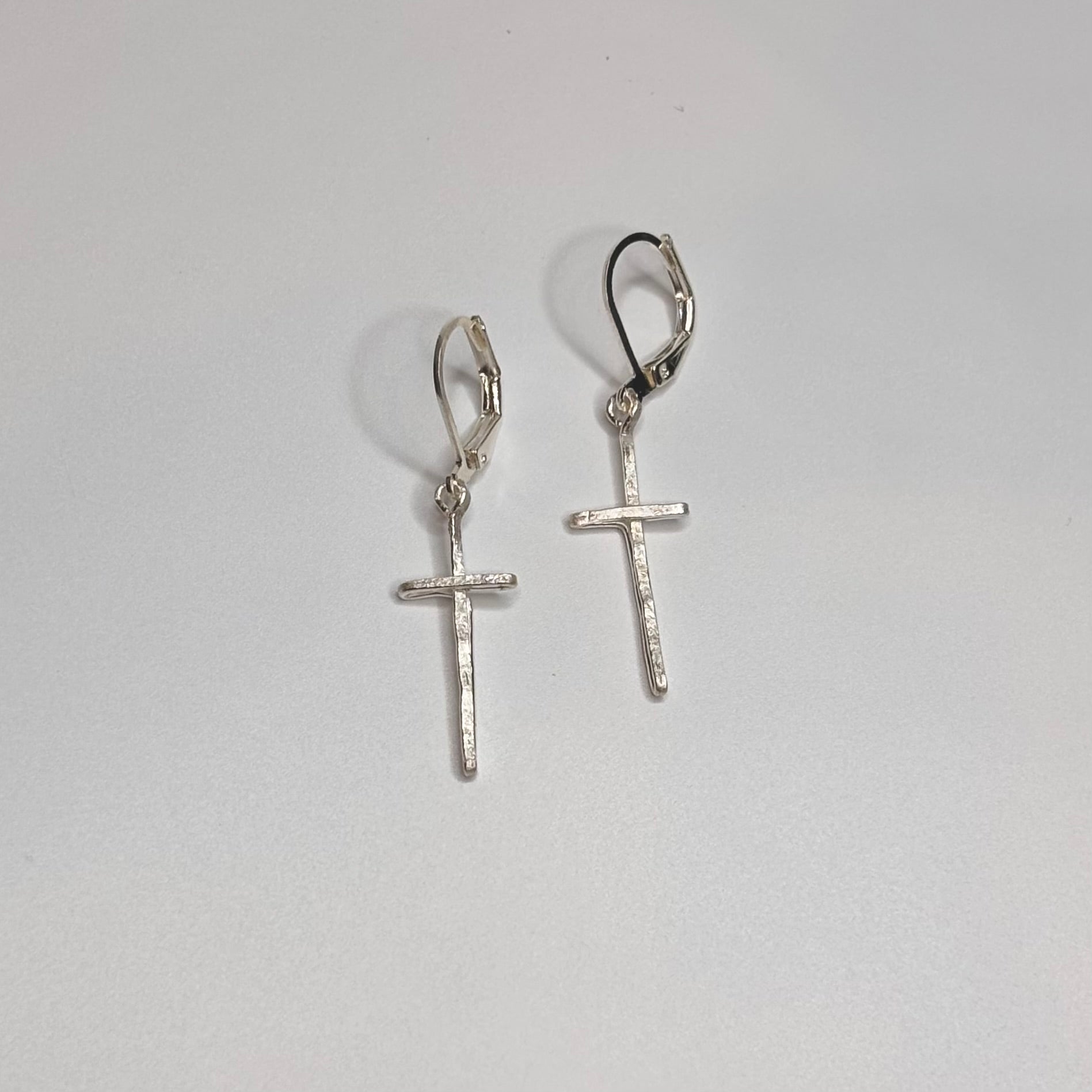Imperfect cross earrings