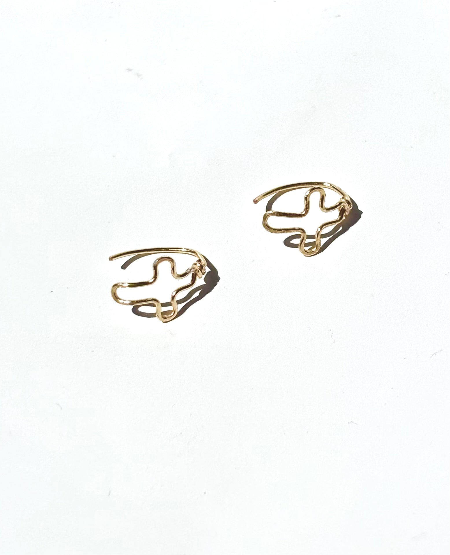 Outline Cross Studs
