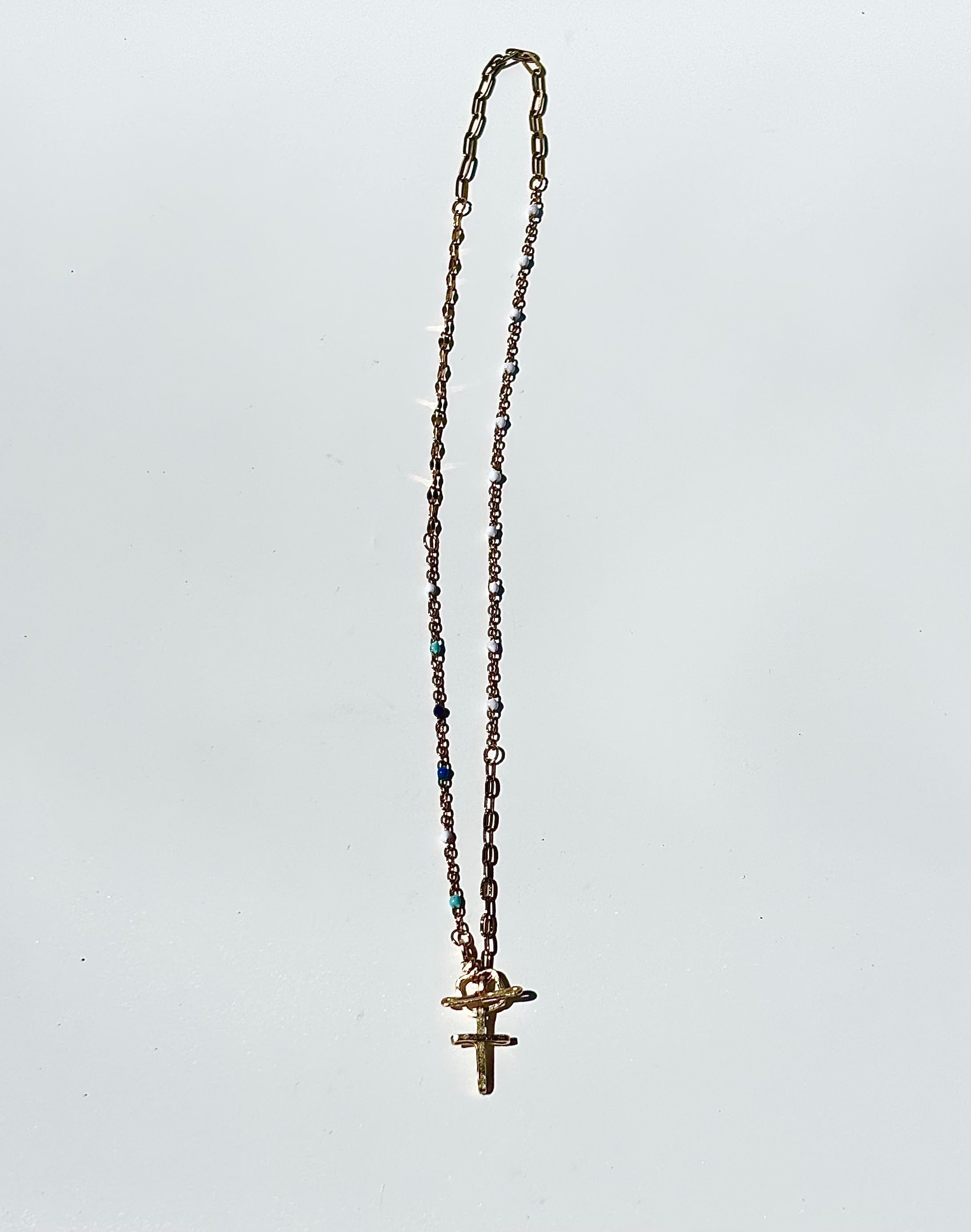 The broken pieces toggle cross chain