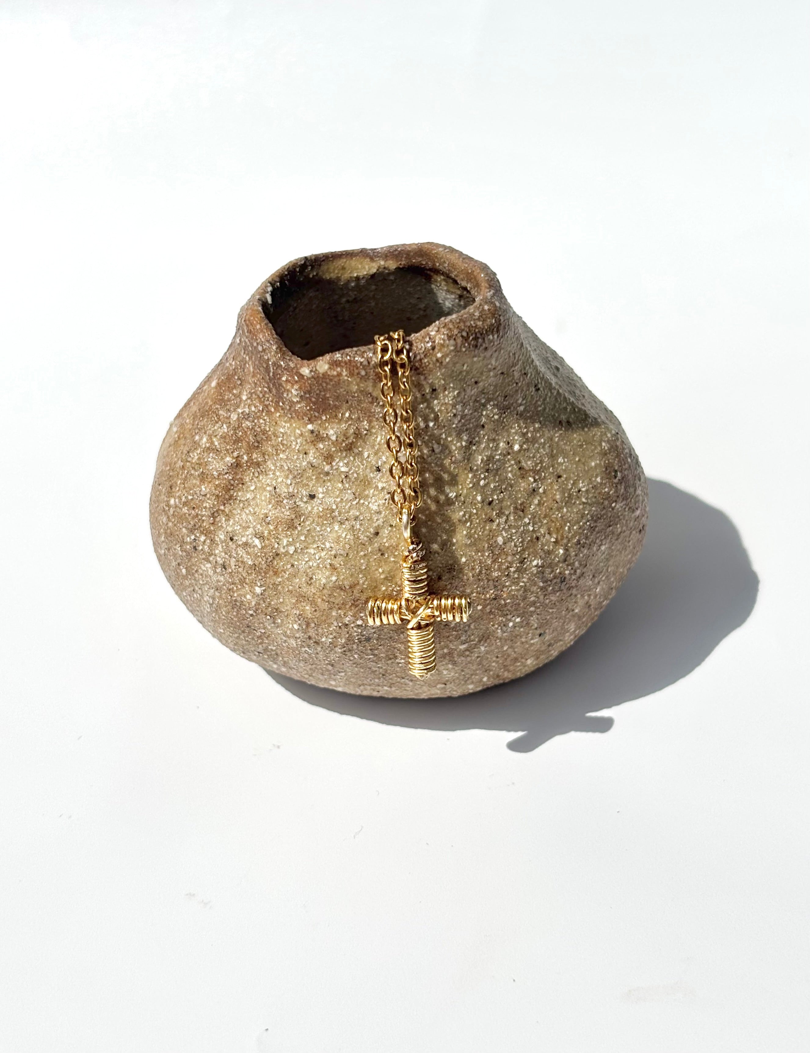 The textured cross necklace