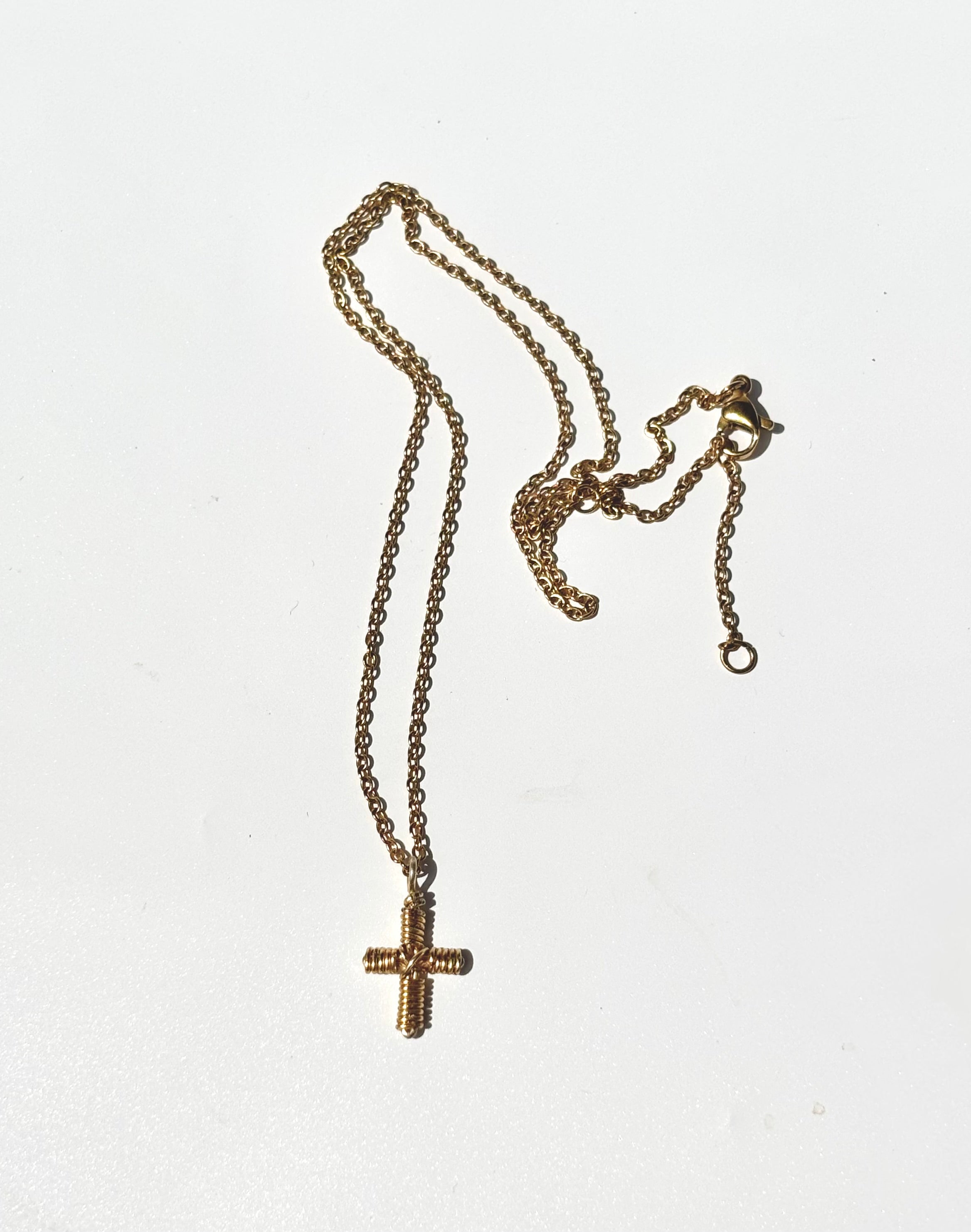 The textured cross necklace