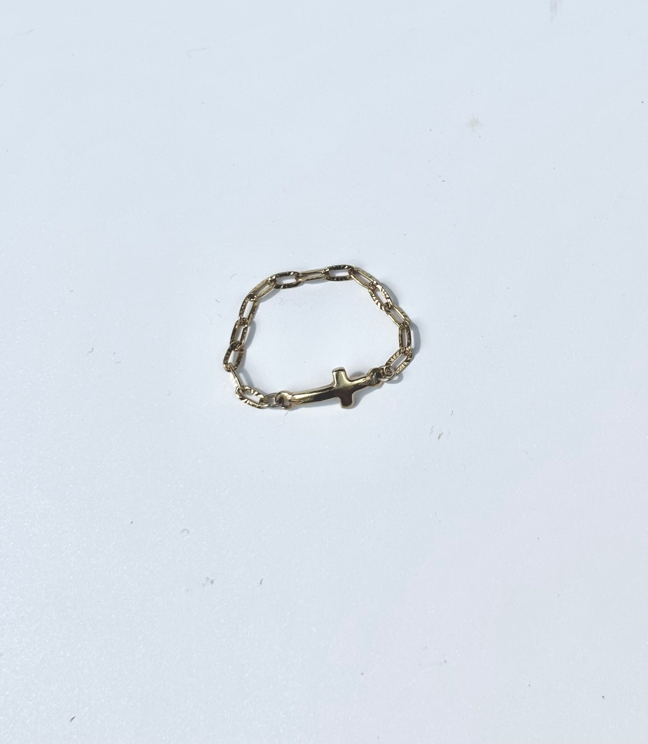 Cross chain ring